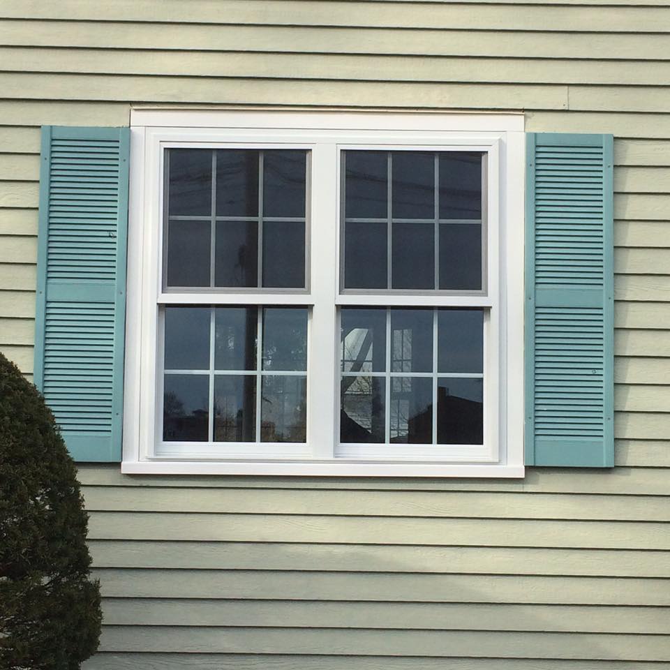 Three Sons Double-Hung Window