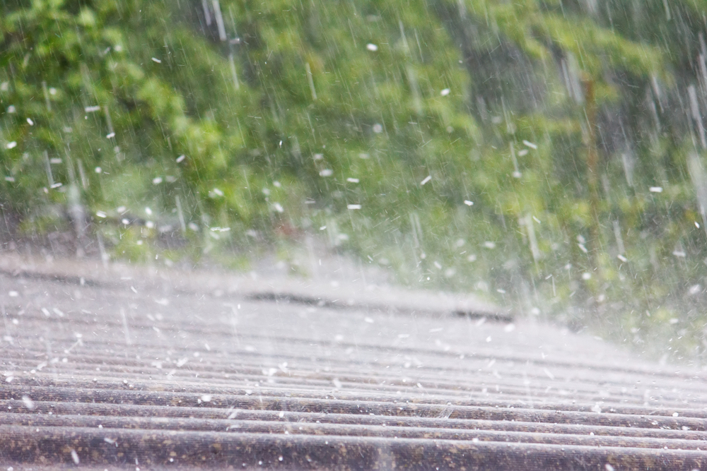roof getting rained on with heavy rain storms and wind being protected with proper preparation and insulation