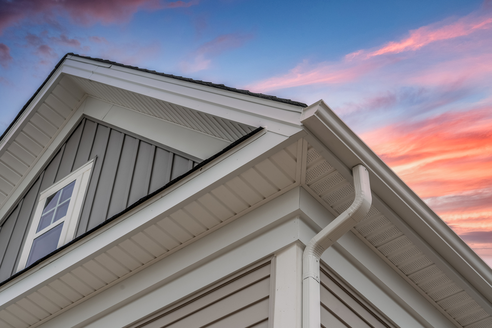new siding on home with vertical and horizontal paneling similar to james hardie fiber cement siding
