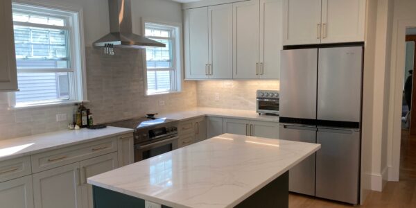 arlington kitchen remodel by three sons window door custom countertop installation new hardwood floors and custom cabinetry storage