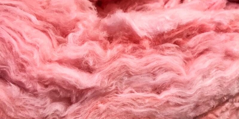 fiberglass insulation pink fluffy insulated material to be installed in home for improved efficiency