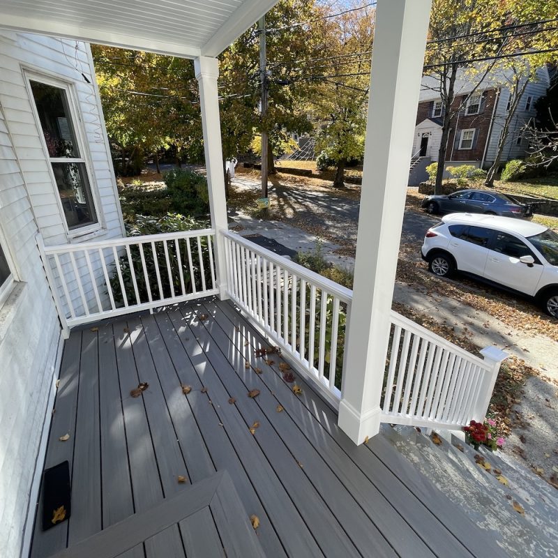 porch renovation with azek landmark decking in castle gate for home in arlington massachusetts by three sons window and more
