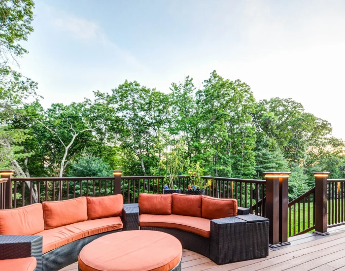 Composite deck with post lights and outdoor furniture