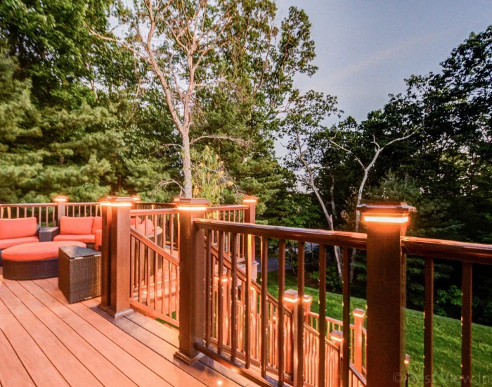 Composite deck at twilight with sectional seating