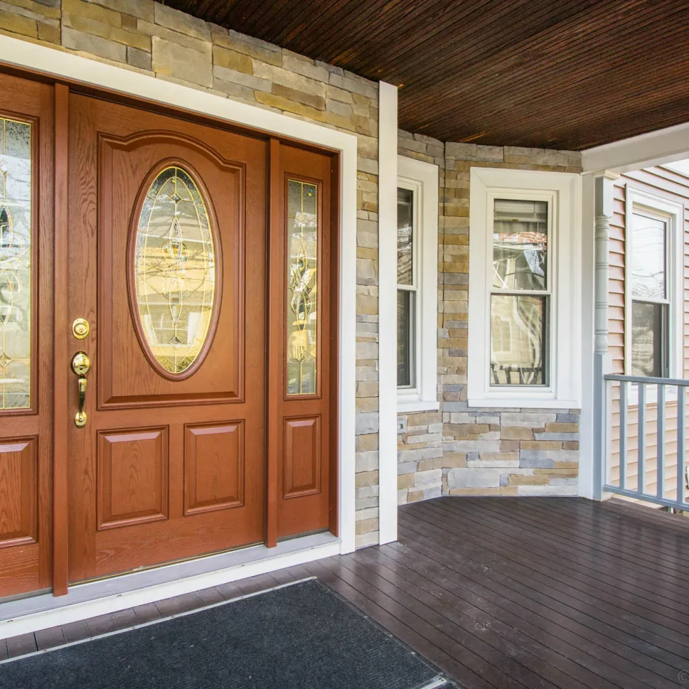 Oval-glass entry door with sidelights
