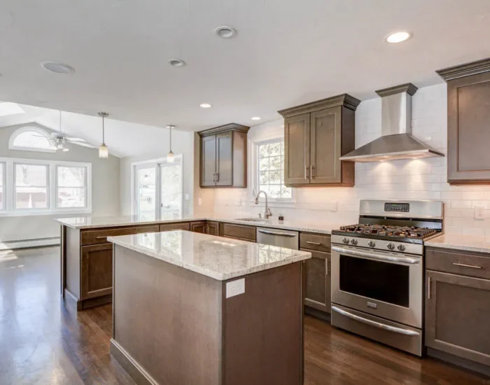 Dark-cabinet kitchen remodel with open-concept living space